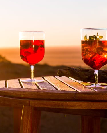 Cocktail Dune Driver mit Passionsfrucht, Minze und Sekt.